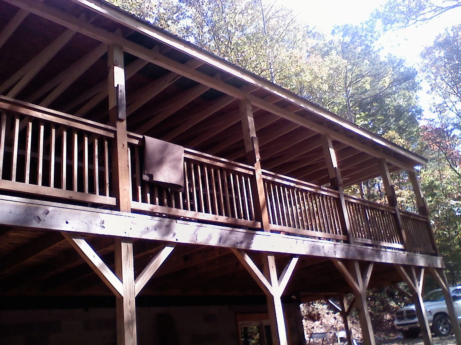 Timber framing under a new elevated porch and deck — Roof Leak Repair in Astor by Roofing Brothers